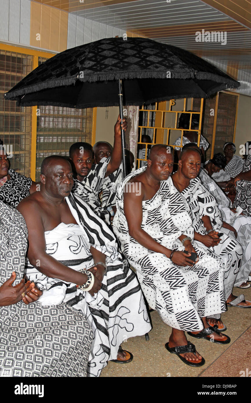 Mourner Wearing Traditional White and Black Funeral Adrinka Clothing, Kumasi, Ghana Stock Photo