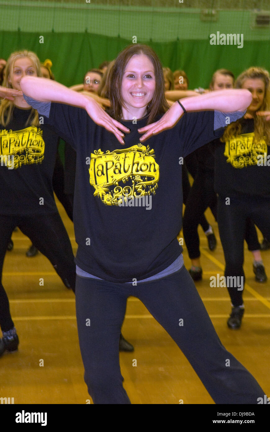 Teenage dance troupe taking part in a nationwide synchronised Tapathon for Children in Need 2013, Alton, Hampshire, UK. Stock Photo