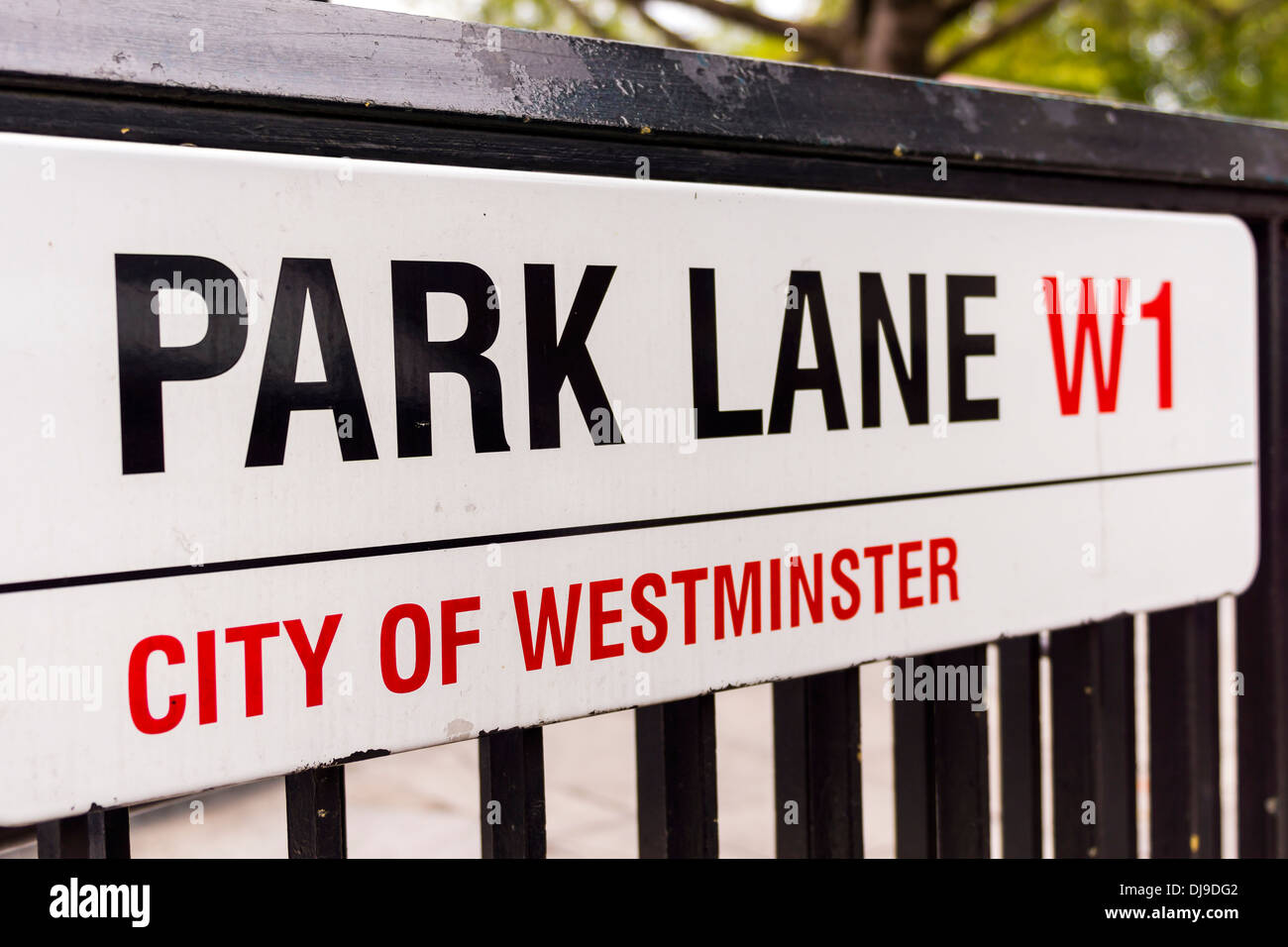 Park Lane, W1 City of Westminster sign on black railings in the city of London. Stock Photo