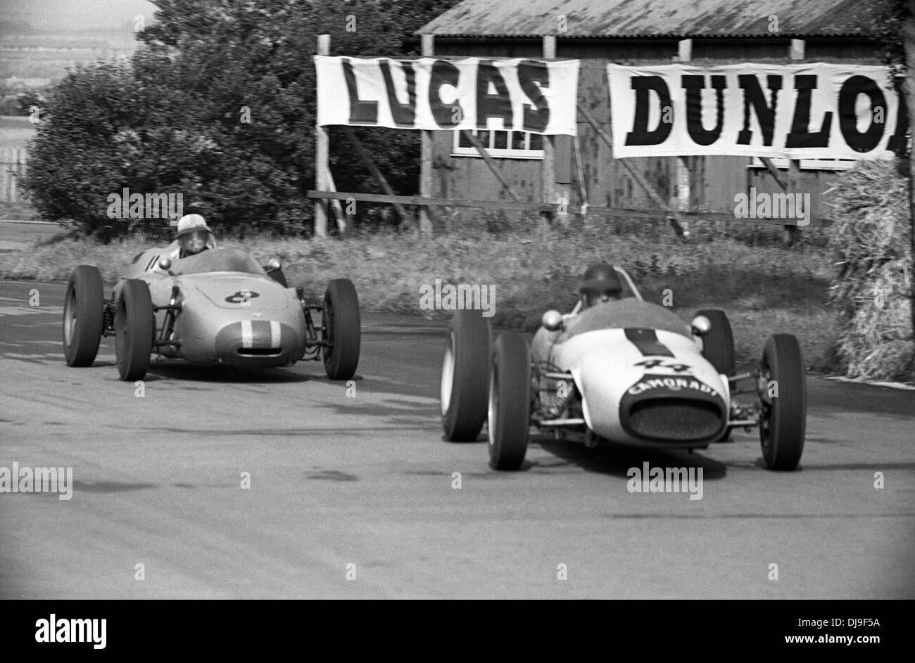 No 44 Ian Burgess in the LotusClimax leading no 8 Jo Bonnier in Porsche 718 British Grand Prix