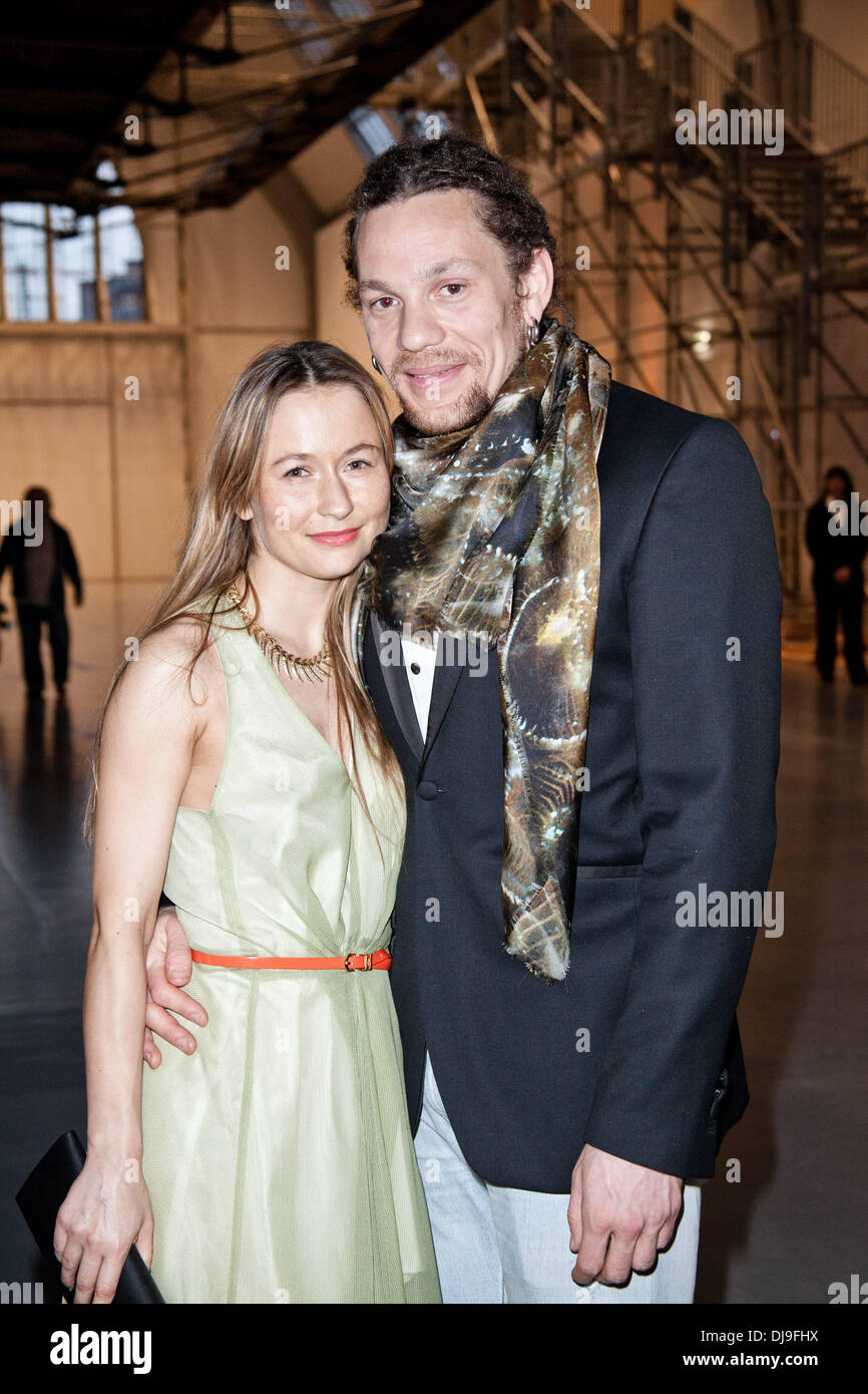 Stefan Eckert and Isabella Kobza at a Next Art Generation gala honoring british artist Antony Gormley at Deichtorhallen. All guests had to take off their shoes for the event. Hamburg, Germany - 25.04.2012 Stock Photo