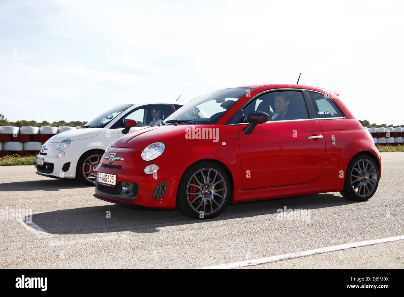 Mickie Krause and Andy Bar filming a car race for German VOX TV show 'Promis am Limit' at Circuito Mallorca race track near El Arenal. Majorca, Spain - 08.05.2012 Stock Photo