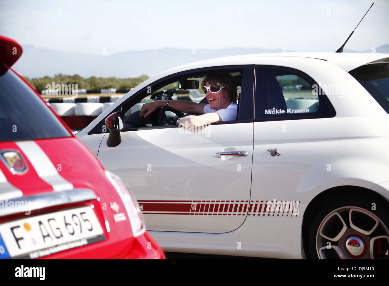 Mickie Krause filming a car race for German VOX TV show 'Promis am Limit' at Circuito Mallorca race track near El Arenal. Majorca, Spain - 08.05.2012 Stock Photo