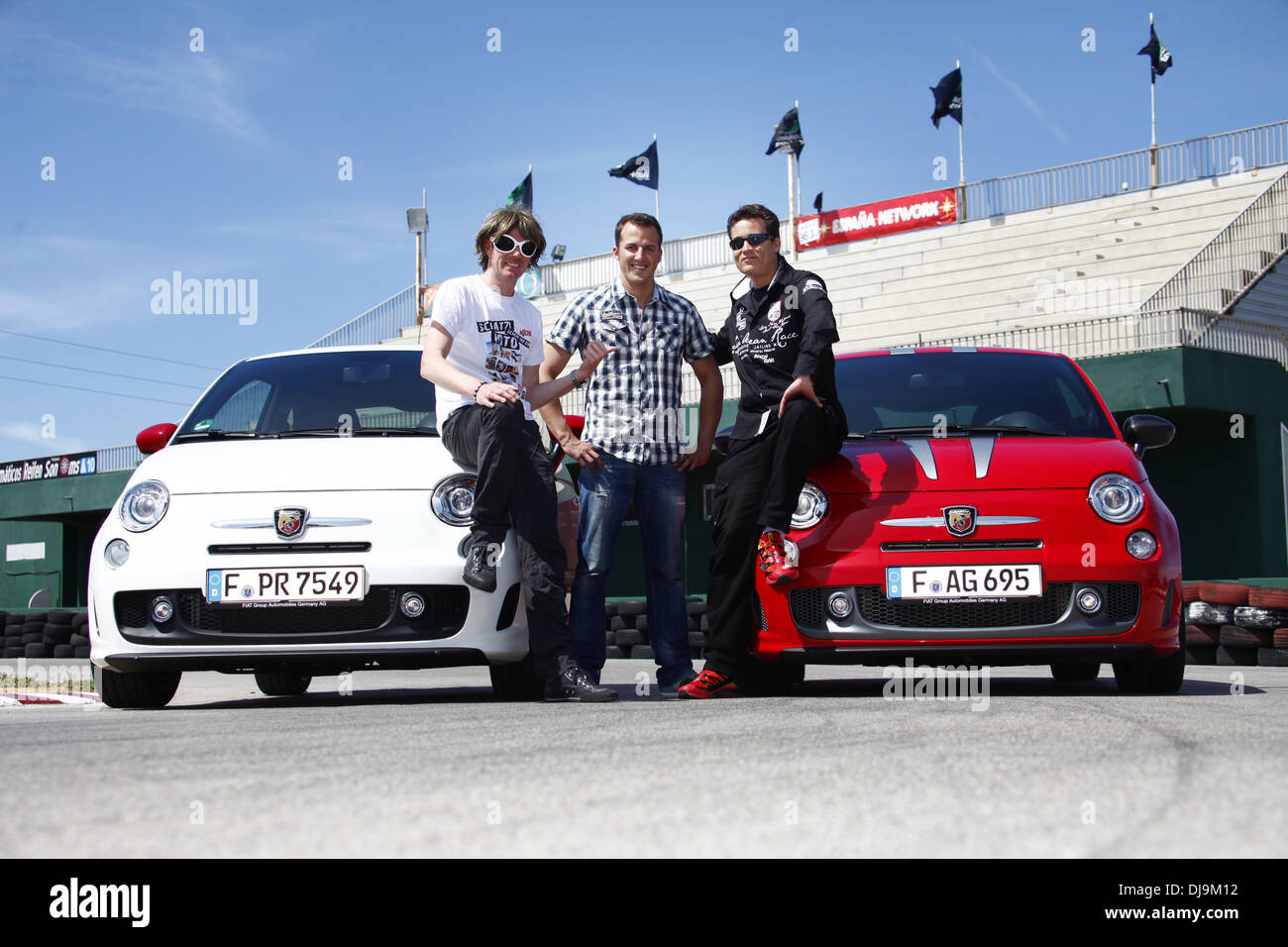 Lance David Arnold, Mickie Krause and Andy Bar filming a car race for German VOX TV show 'Promis am Limit' at Circuito Mallorca race track near El Arenal. Before the race, racing driver Lance David Arnold gives Krause and Bar an introduction into race dri Stock Photo