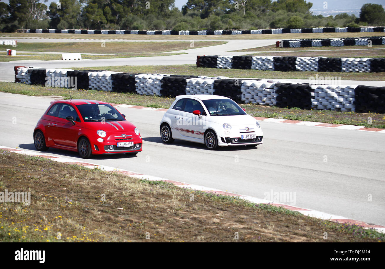 Mickie Krause and Andy Bar filming a car race for German VOX TV show 'Promis am Limit' at Circuito Mallorca race track near El Arenal. Majorca, Spain - 08.05.2012 Stock Photo