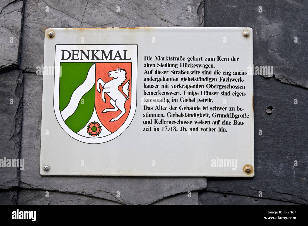 Protected building sign on house in historic center of Hueckeswagen, NRW, Germany Stock Photo