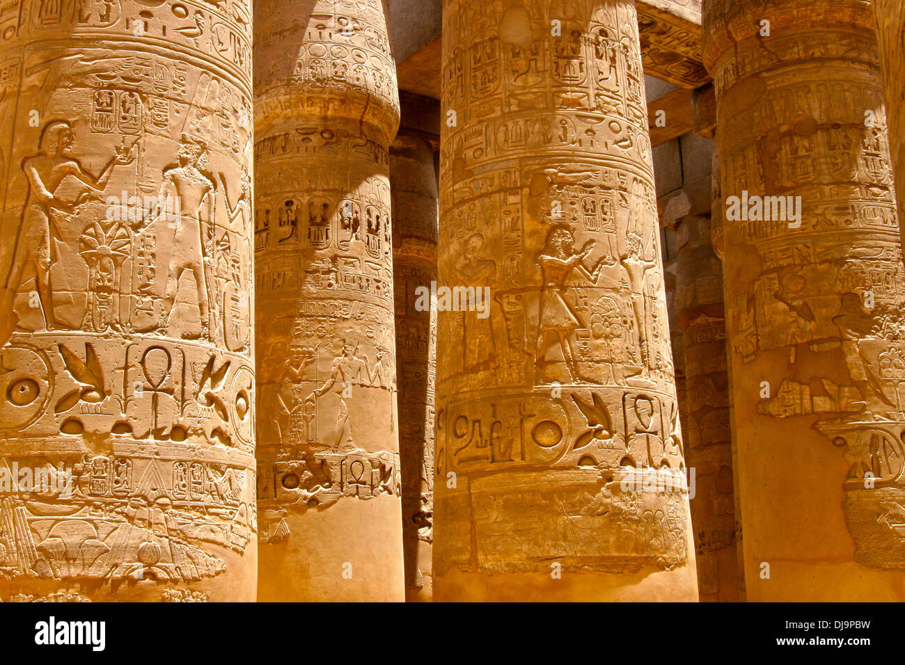 Close up of columns covered in hieroglyphics, Karnak, Egypt. Stock Photo