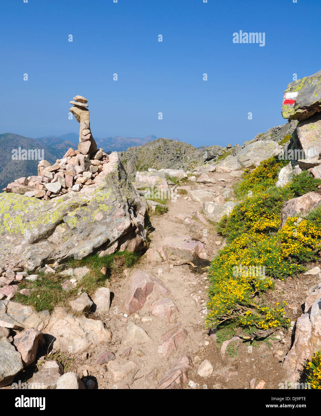 red and white marking footpath gr 20 in Corsica Stock Photo