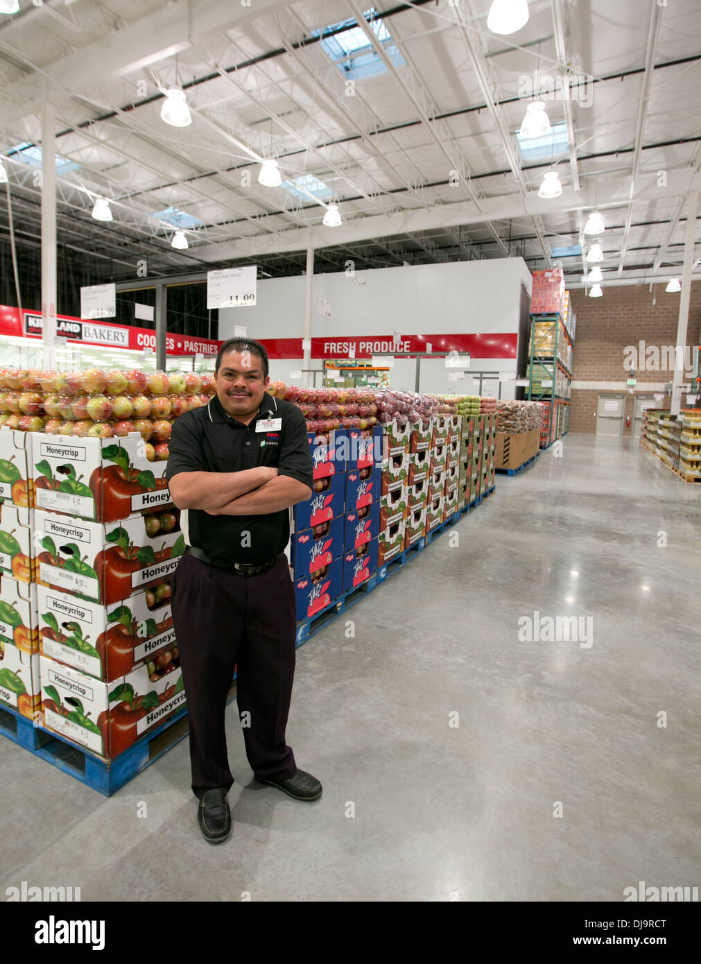 COSTCO employees arrange items in newly open store in Texas Stock Photo
