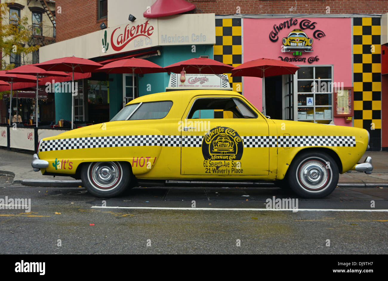 A 1950 Studebaker, the Taco Taxi,  parked outside the Calienete Cab Co. Mexican restaurant in Greenwich Village, New York City Stock Photo