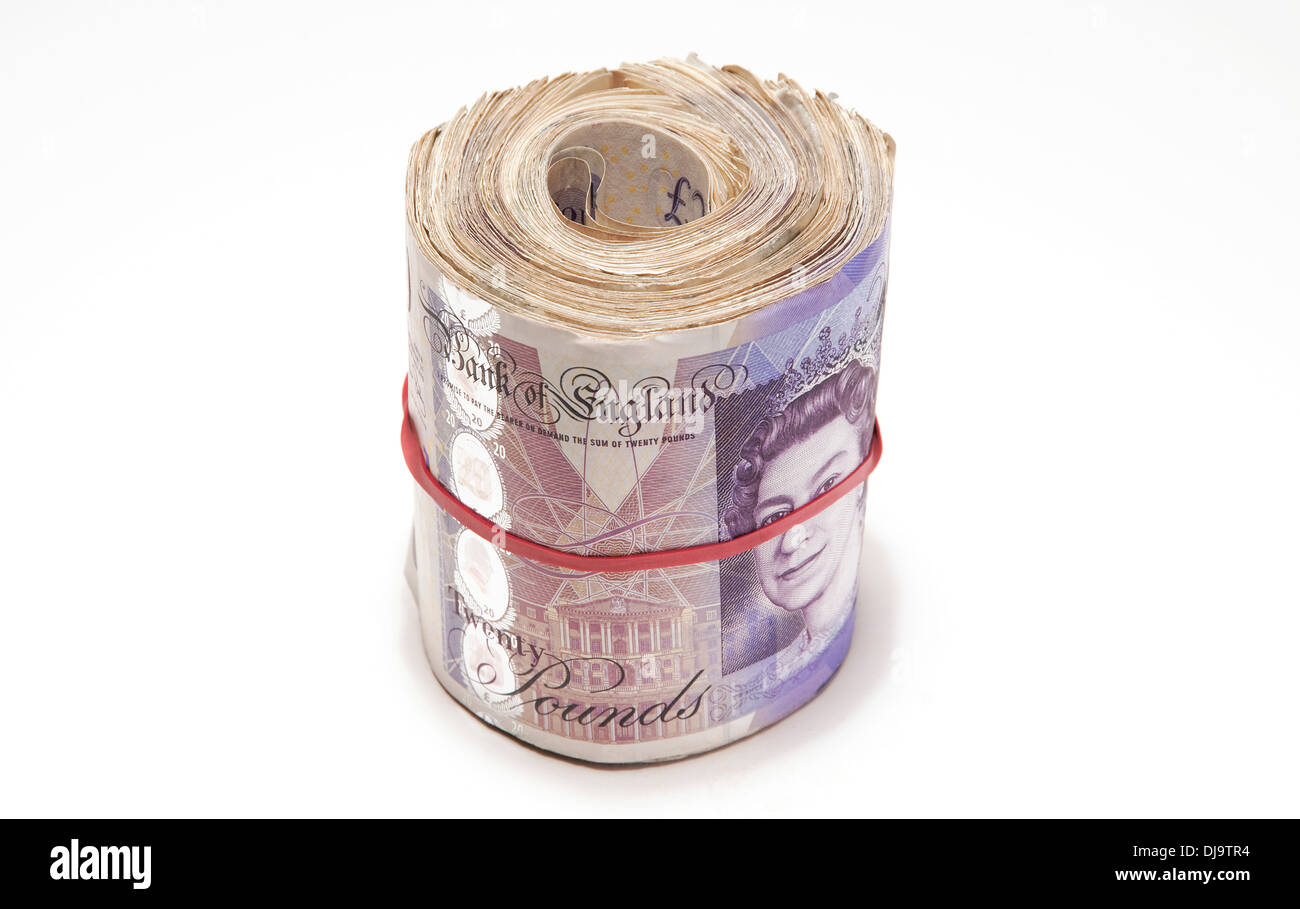 wad of twenty pound notes on white background Stock Photo