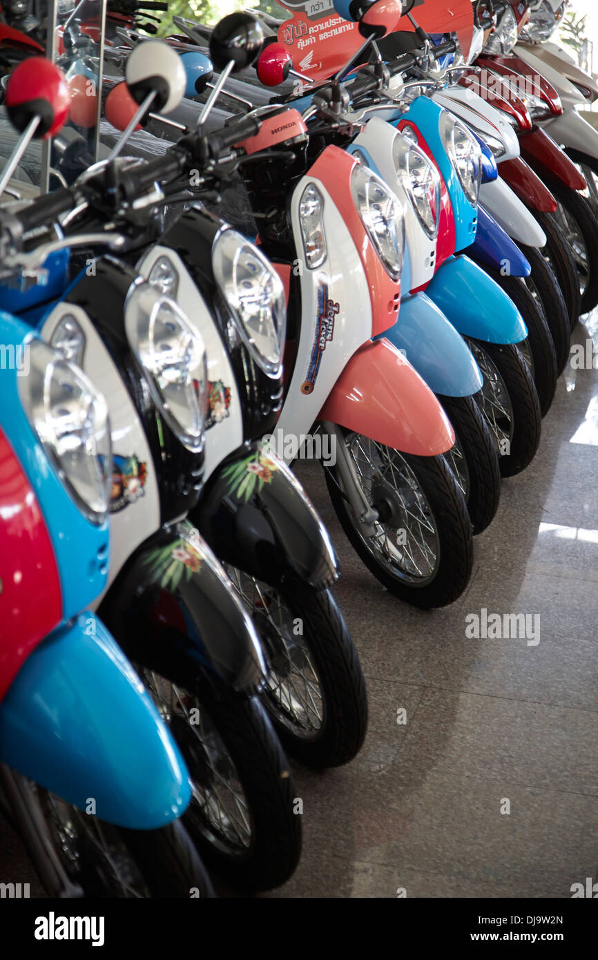 Teenageår fire civile Motorcycle motorbike showroom showing all the range of scooters on sale in  Korat, Thailand Stock Photo - Alamy