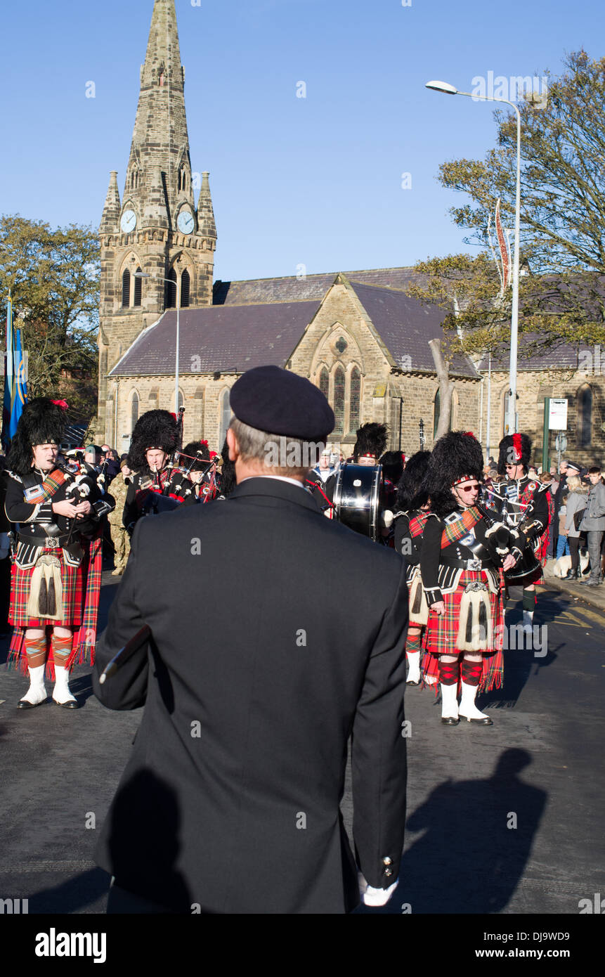 Pipes and drum band prepare to lead march Remembrance Sunday in