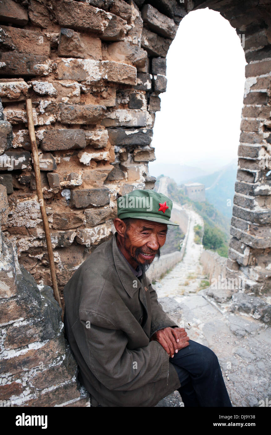 A local man/hawker on The Great Wall of China near Jinshanling. Stock Photo
