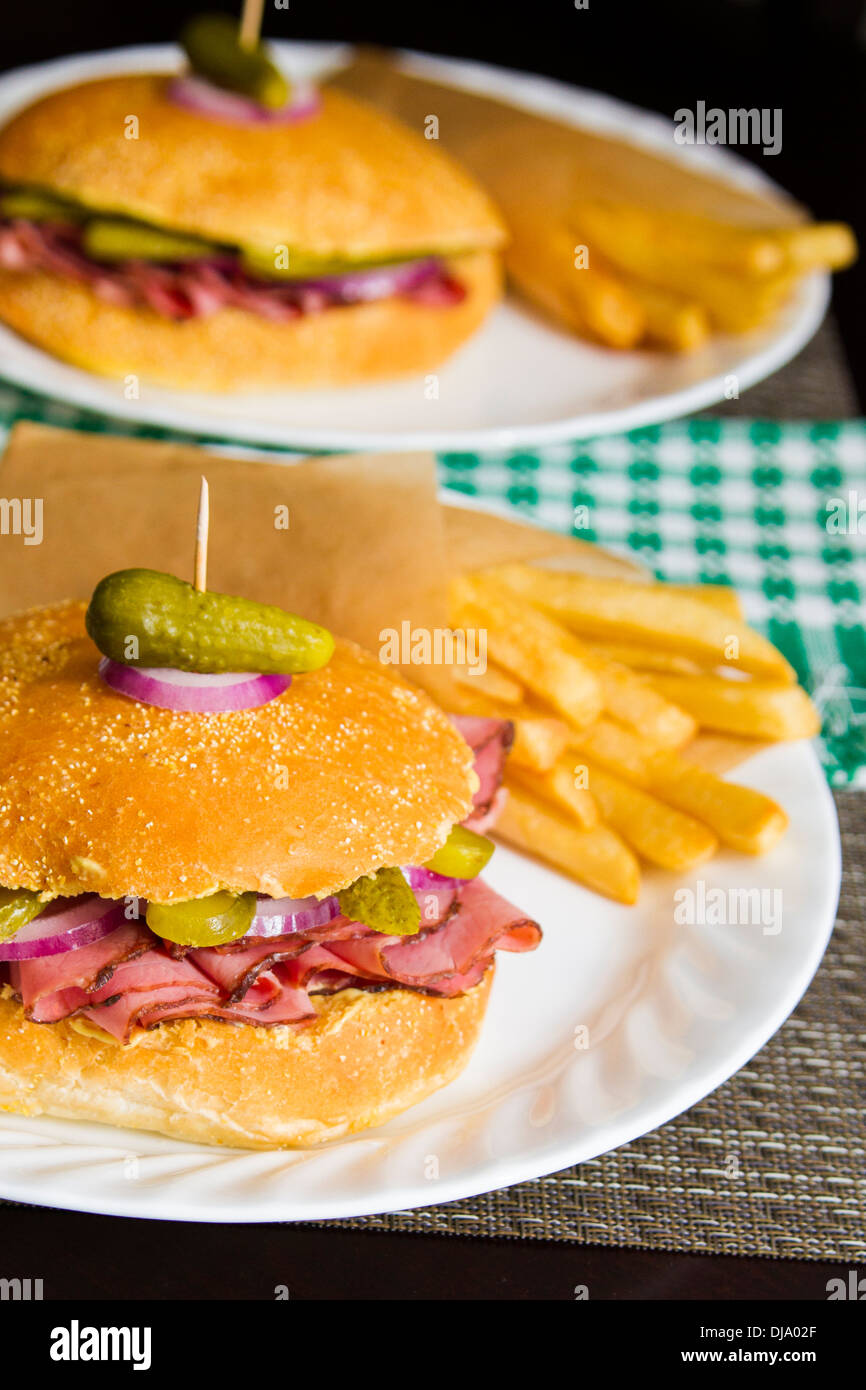 Roast beef sandwich with fries Stock Photo Alamy