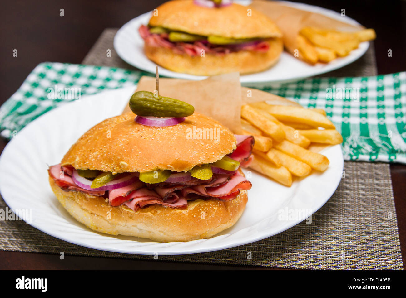 Roast beef sandwich with fries Stock Photo Alamy