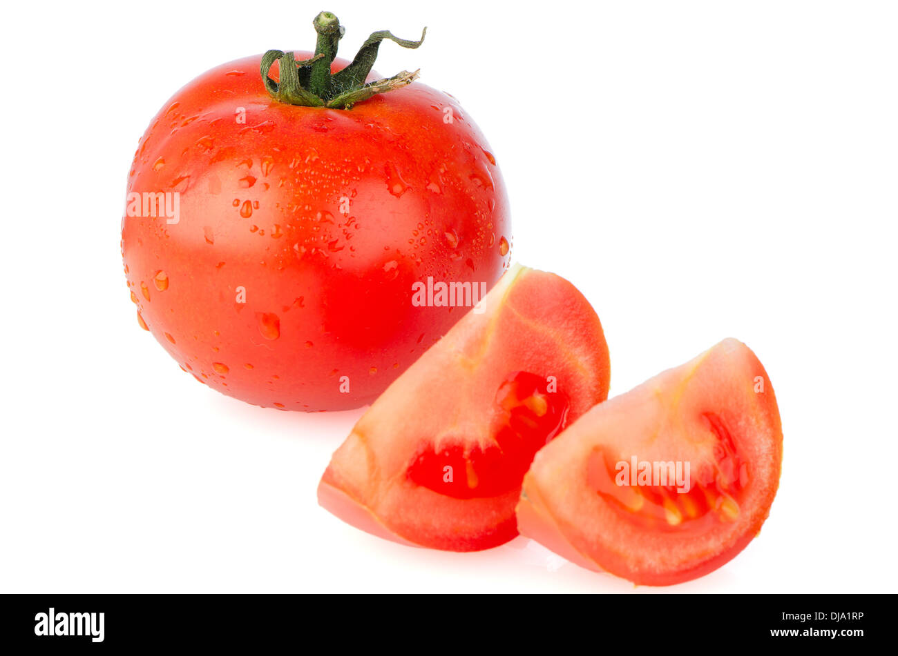 Red tomatos isolated on white background Stock Photo - Alamy
