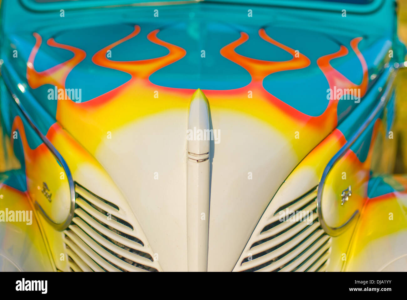 A 1939 Ford hot rod with flames painted on the hood. Stock Photo