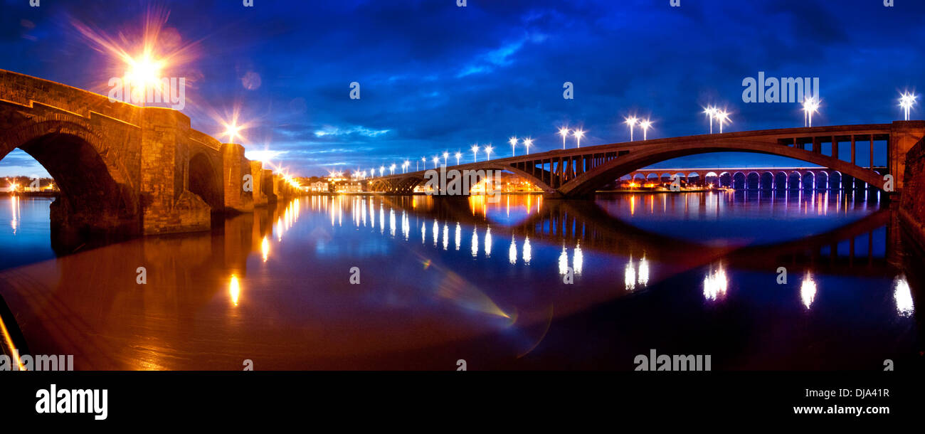Evening Berwick upon Tweed and the three bridges that span the Tweed at Berwick Stock Photo