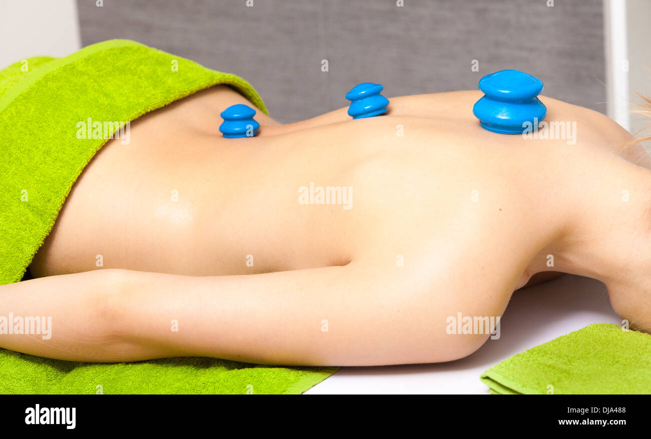 Beauty treatment concept. Woman getting spa therapy cupping rubber