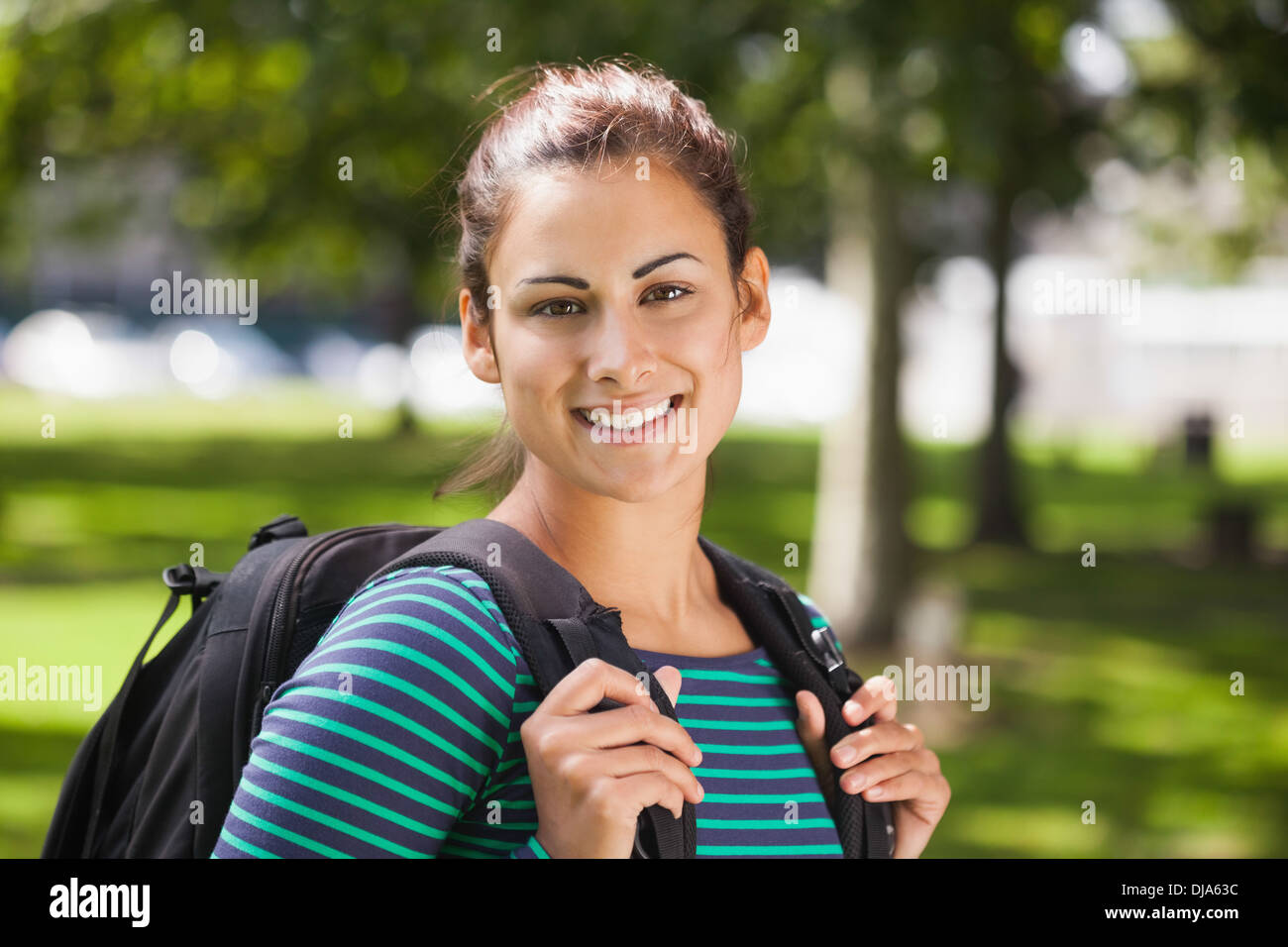 Casual smiling student looking at camera Stock Photo - Alamy