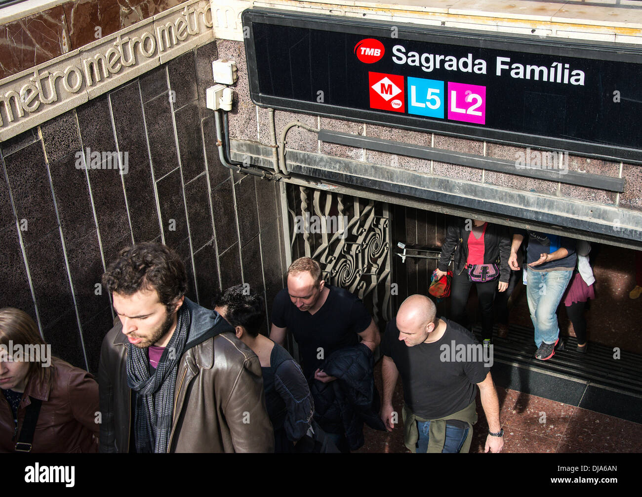 Busy metro stop and the Sagrada Familia, Barcelona, Spain Stock Photo