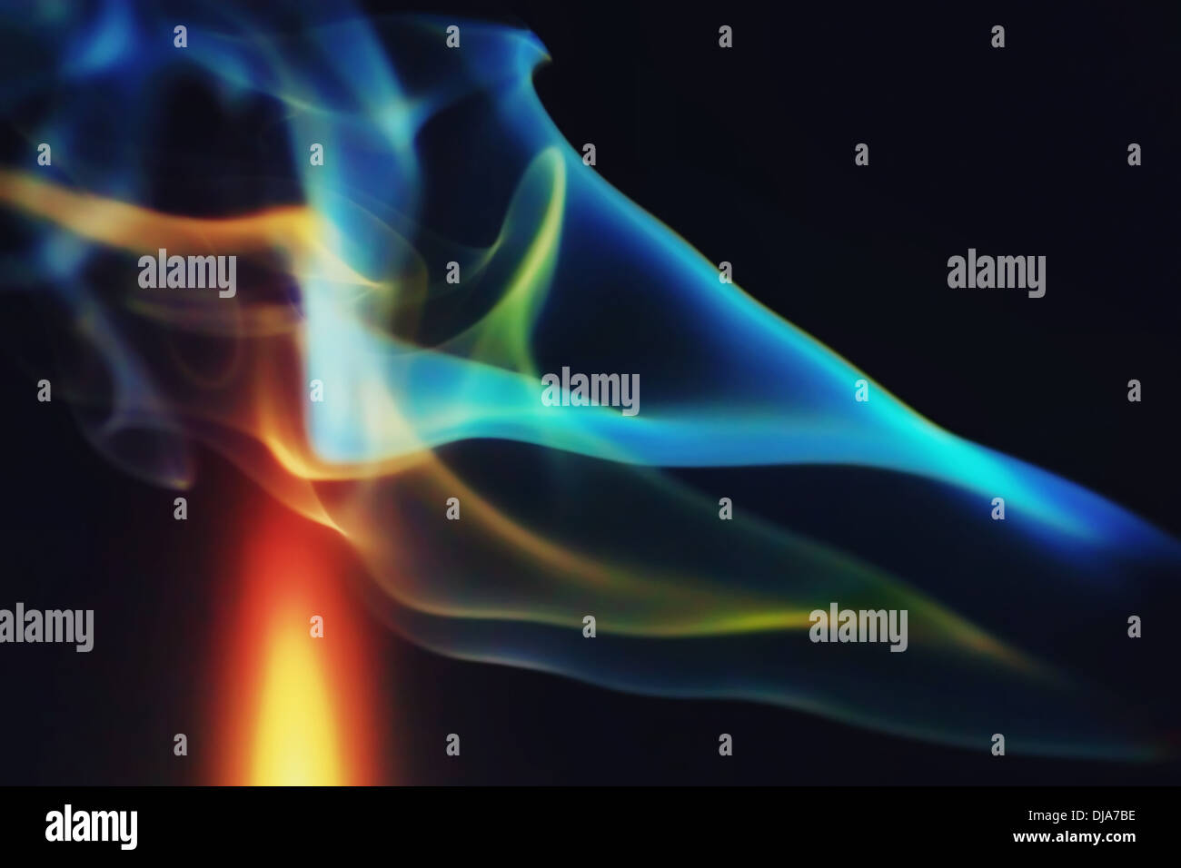 Abstract colorful smoke on a black background Stock Photo - Alamy