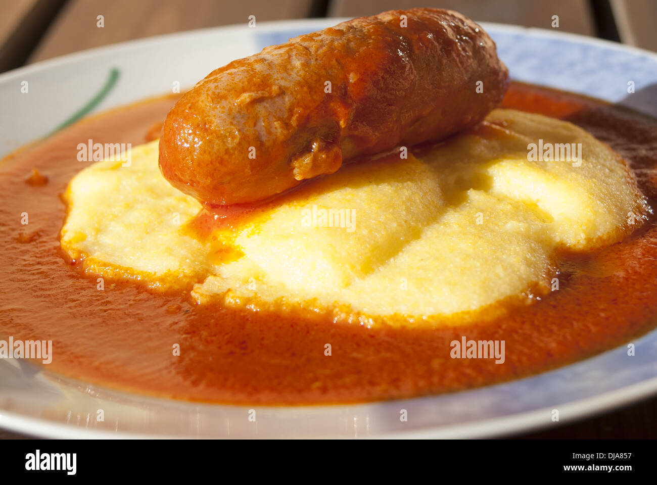 polenta with tomato sauce and sausage Stock Photo