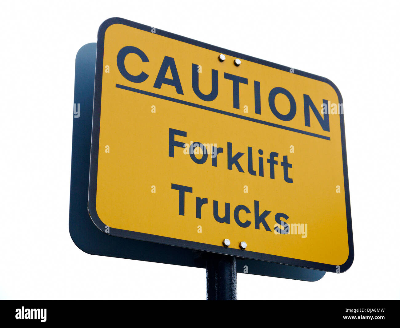 Caution forklift trucks warning sign UK Stock Photo