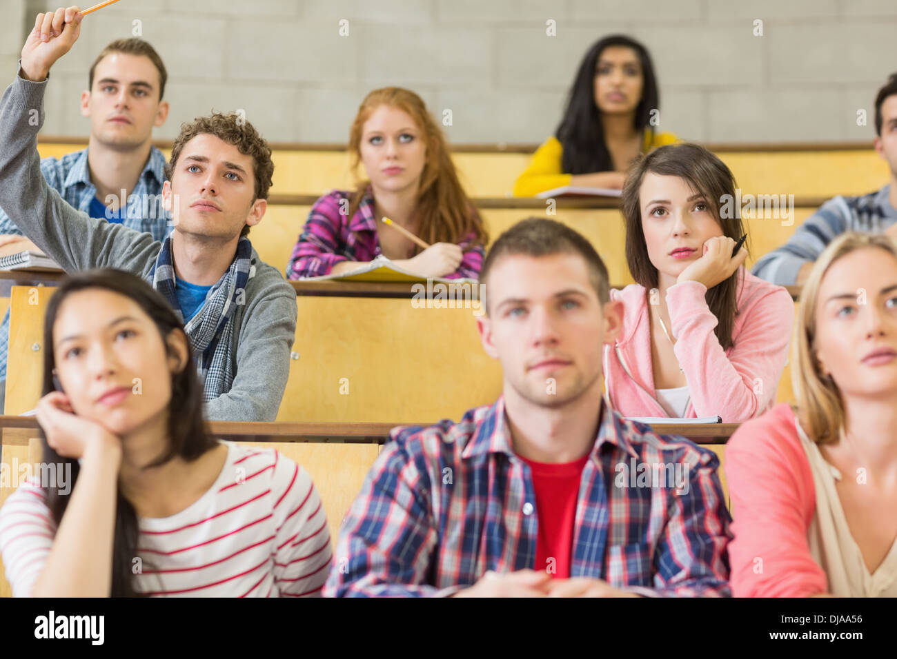 Students sitting at the lecture hall Stock Photo