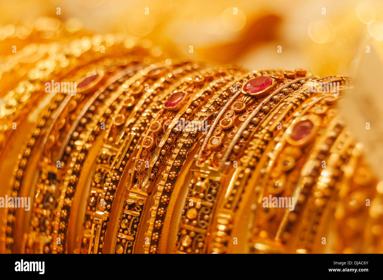 Jewelry for display behind the storefront of a shop in Deira Gold Souk. Dubai, United Arab