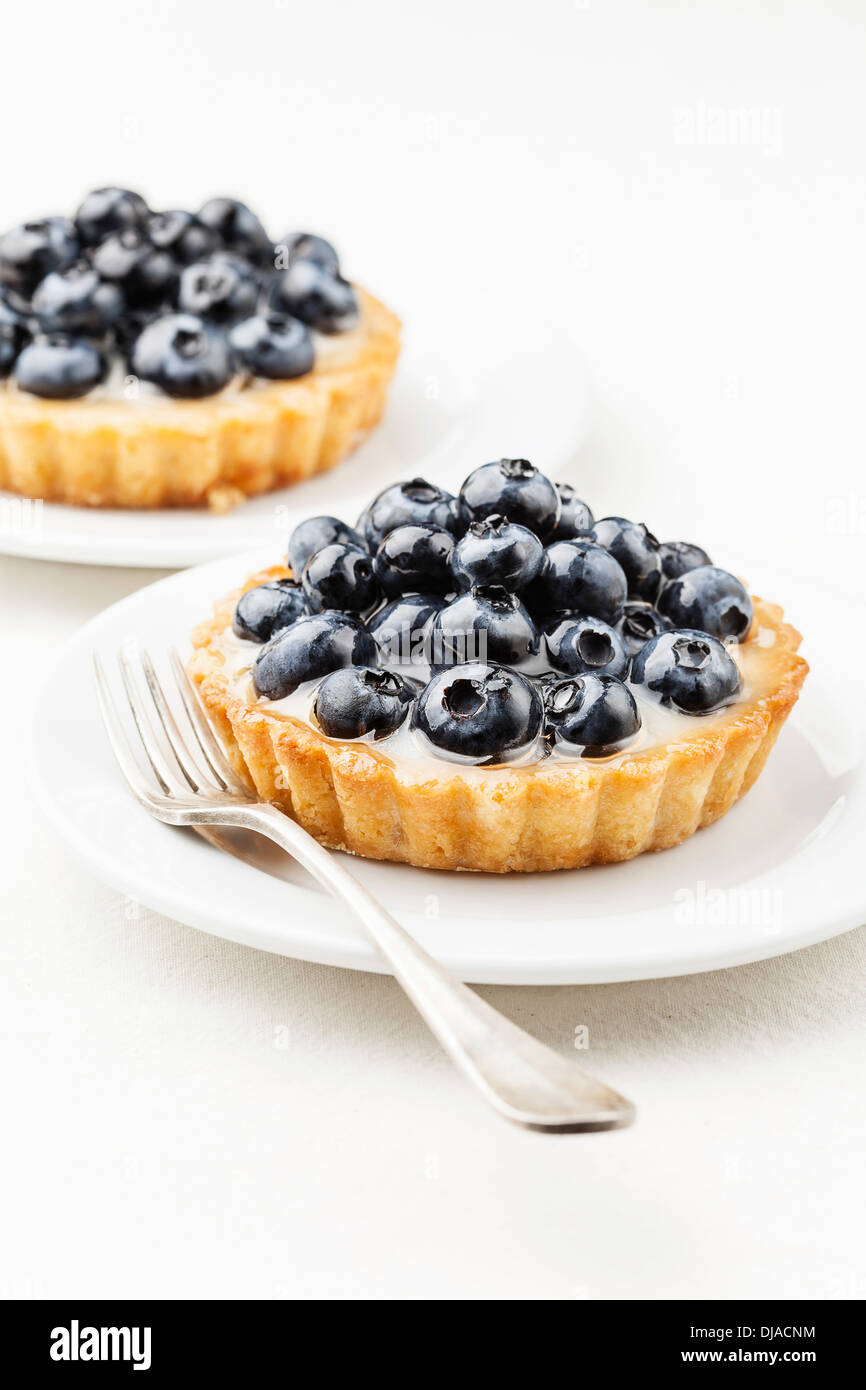 Blueberry tart on white background Stock Photo