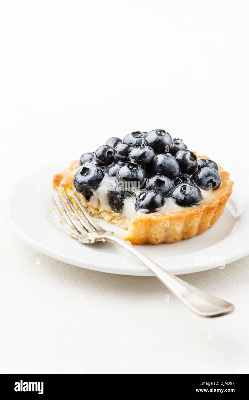 Blueberry tart on white background Stock Photo