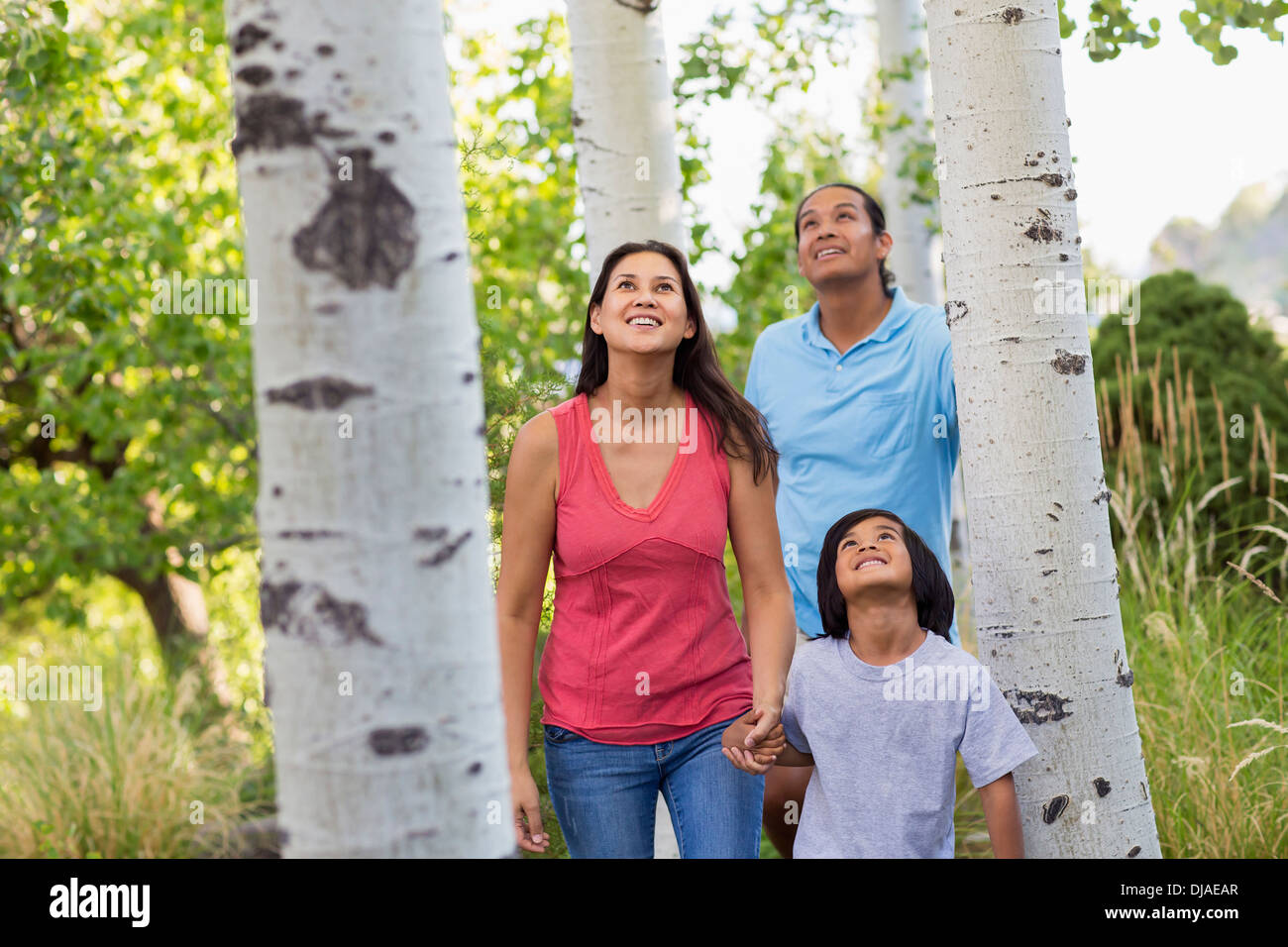 Family walking together outdoors Stock Photo