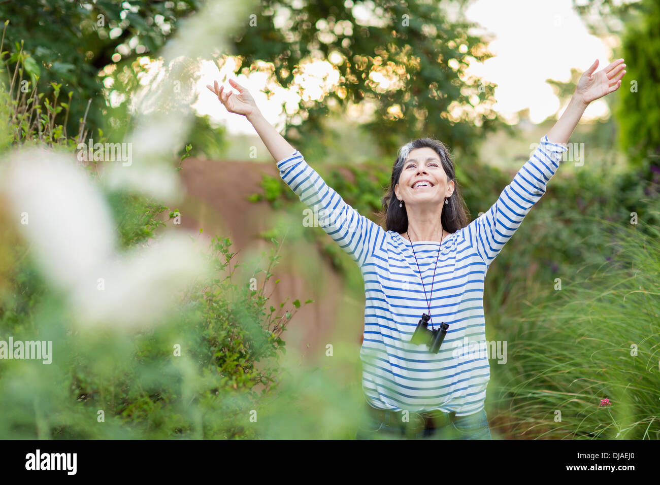 Woman arms outstretched mature hi-res stock photography and images - Alamy