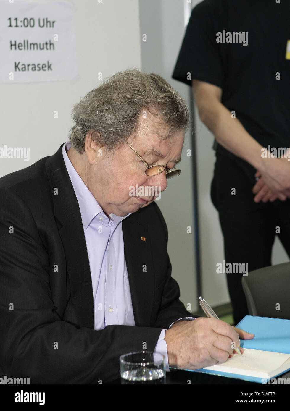 Hellmuth Karasek signing autographs for the launch of his book 'Soll das ein Witz sein?' at Leipziger Buchmesse book fair. Leipzig, Germany - 18.03.2012 Stock Photo