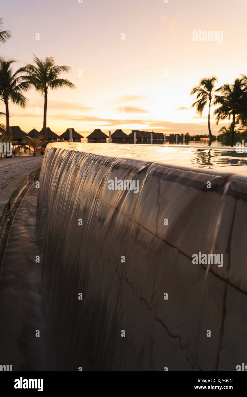 Infinity pool at tropical resort Stock Photo - Alamy
