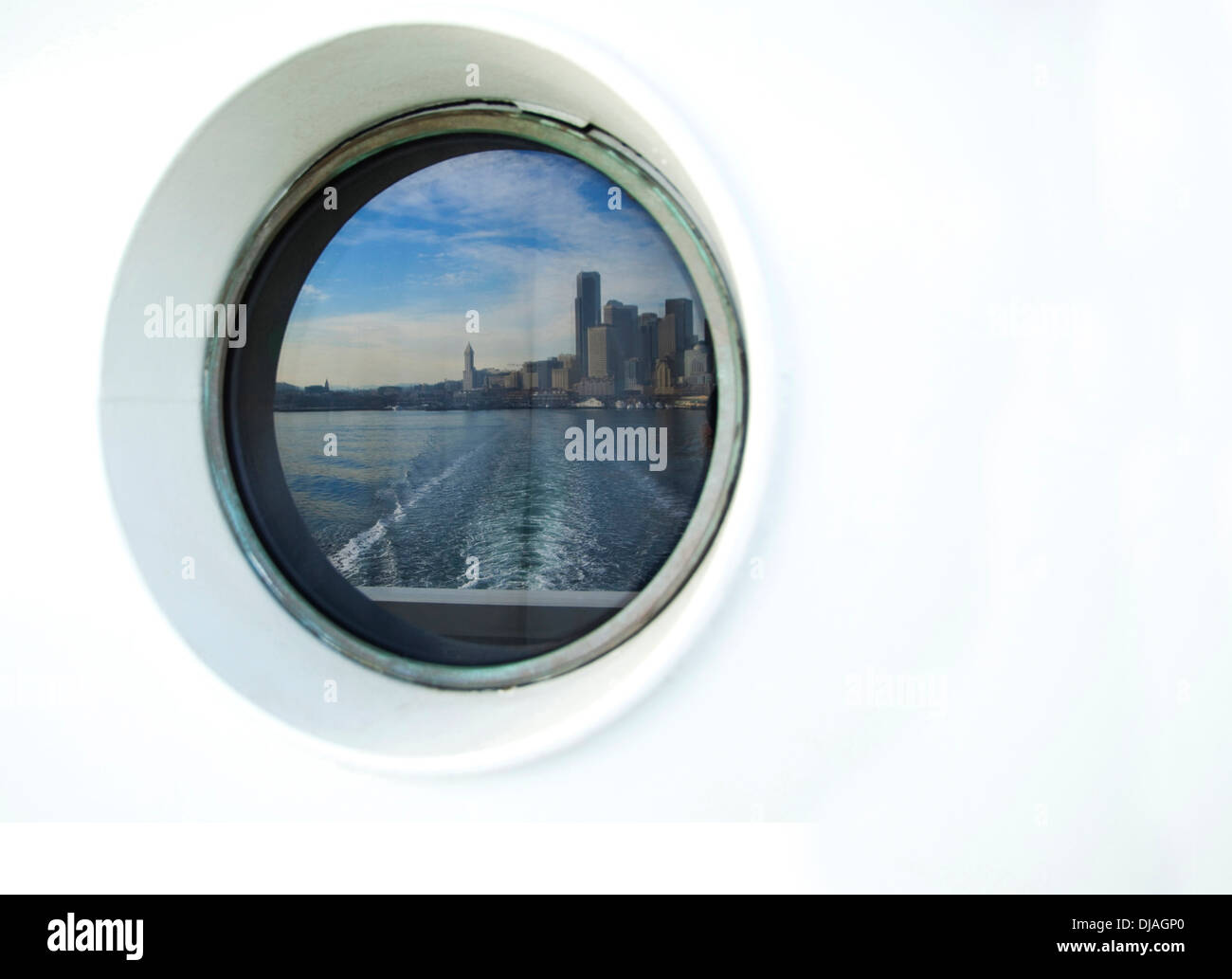 City skyline reflected in ferry porthole, Seattle, Washington, United States Stock Photo