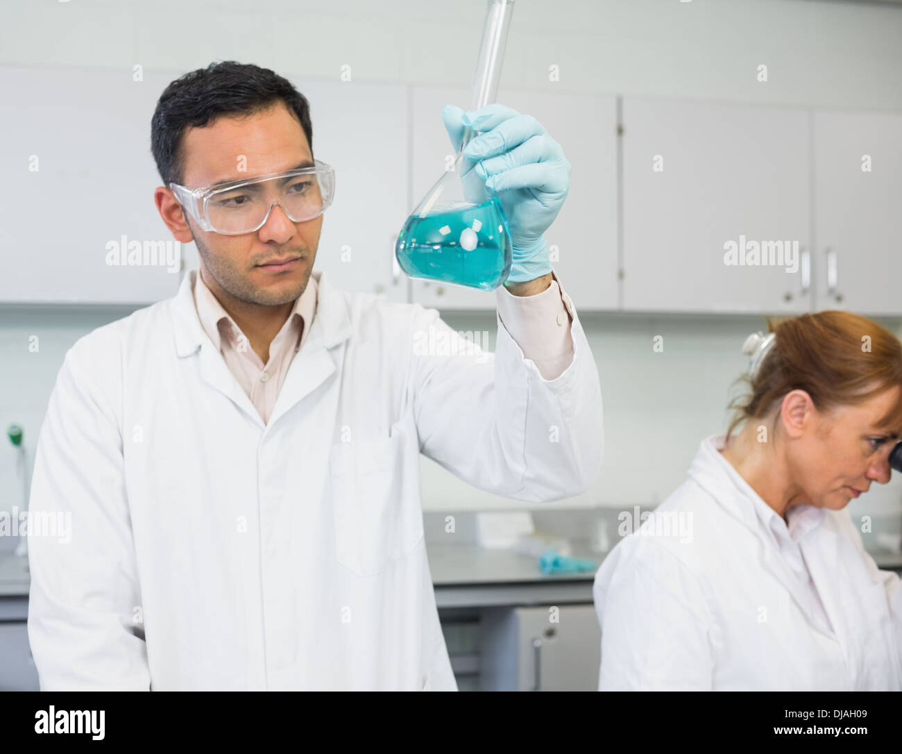 Researcher experimenting in the lab Stock Photo