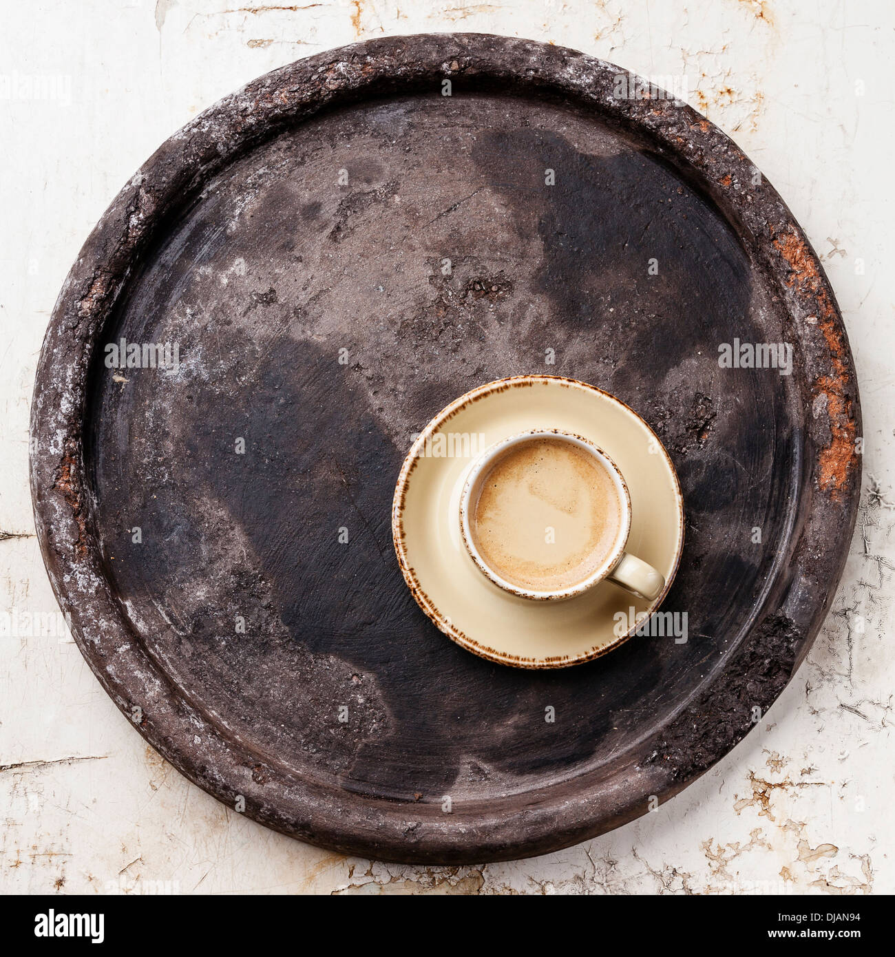 Coffee cup on dark stone tray Stock Photo