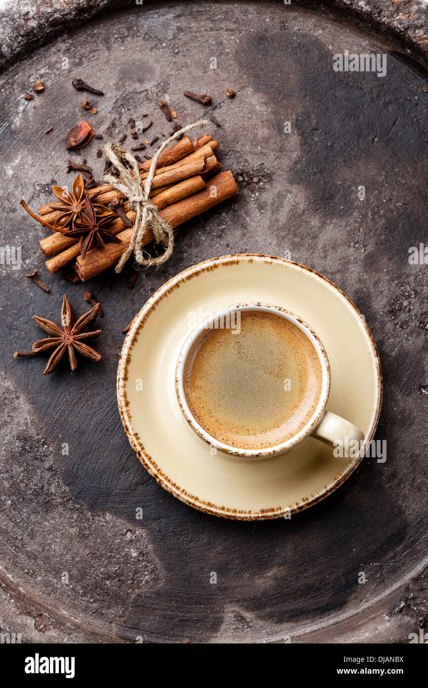 Coffee with spices on dark background Stock Photo