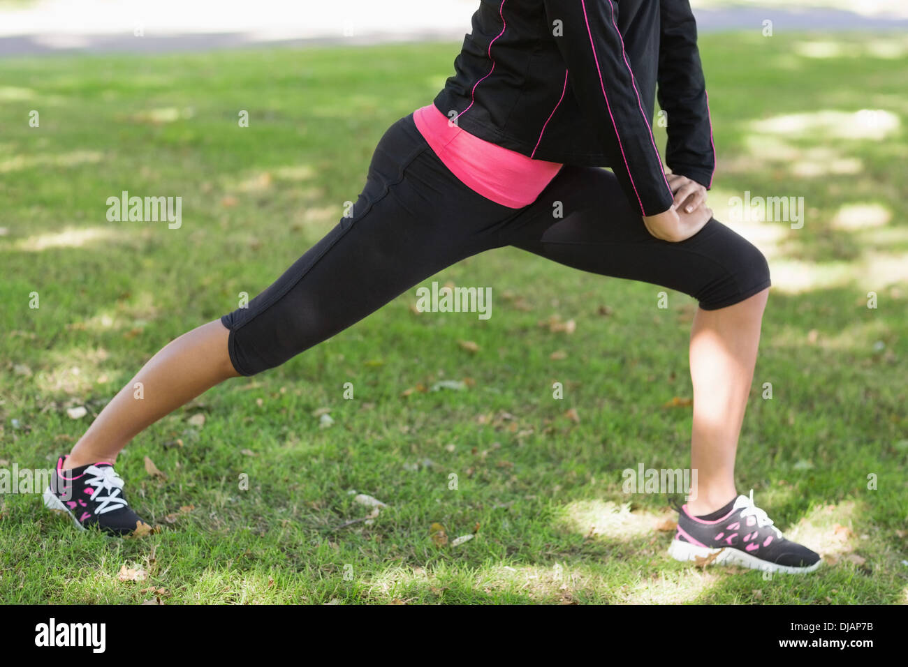Woman stretching low section hi-res stock photography and images - Alamy