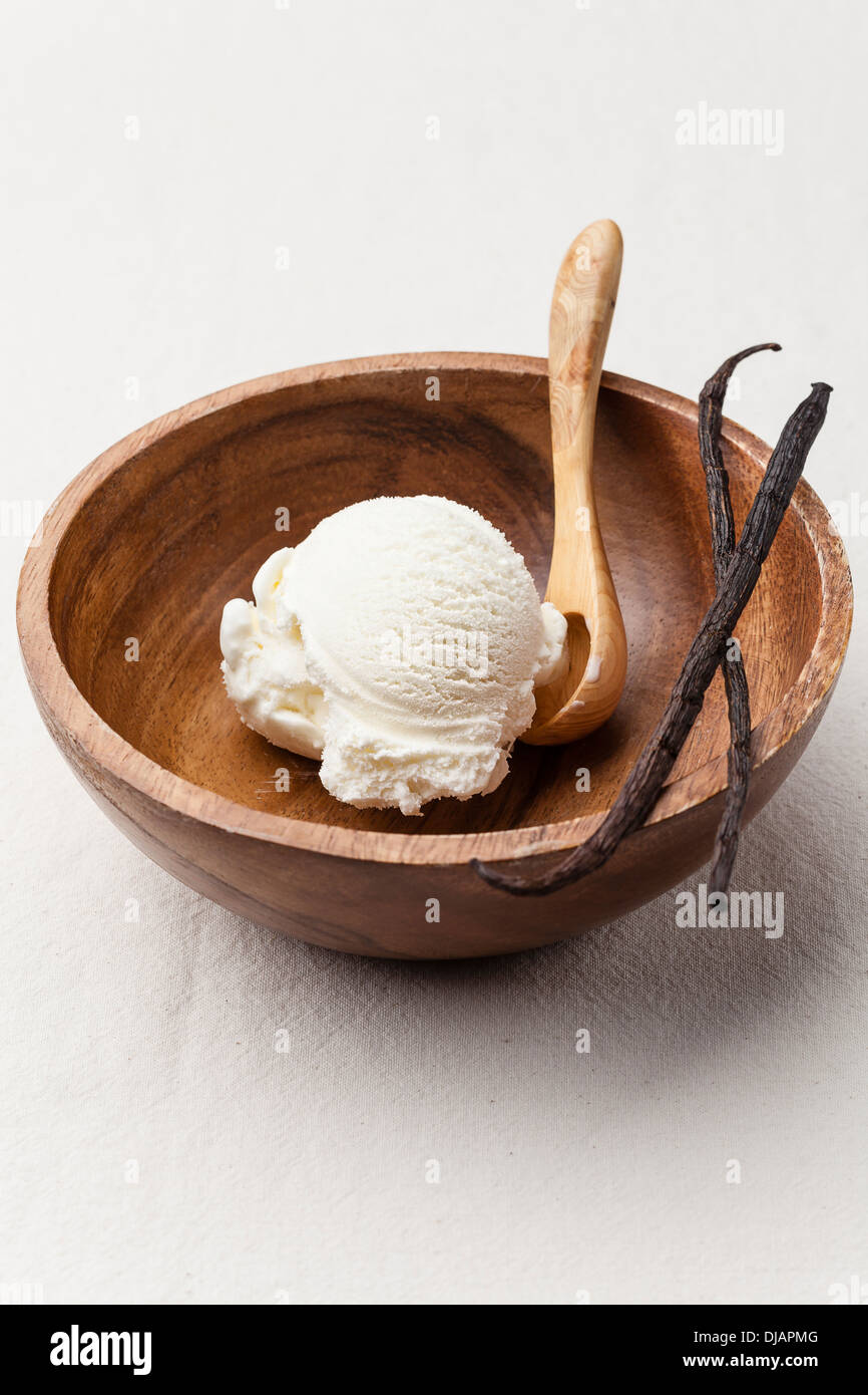 Vanilla ice cream in wooden bowl Stock Photo - Alamy