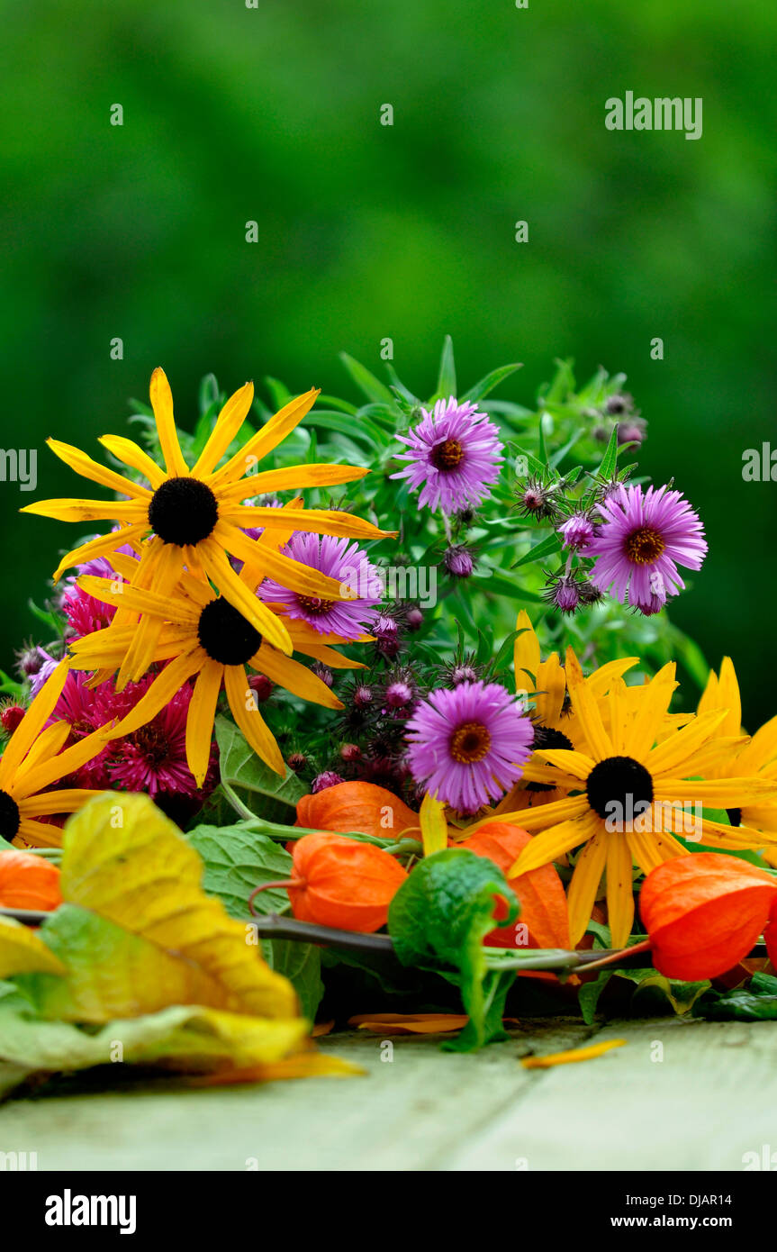 A vibrant mixture of cut flowers from the garden in the autumn UK Stock Photo