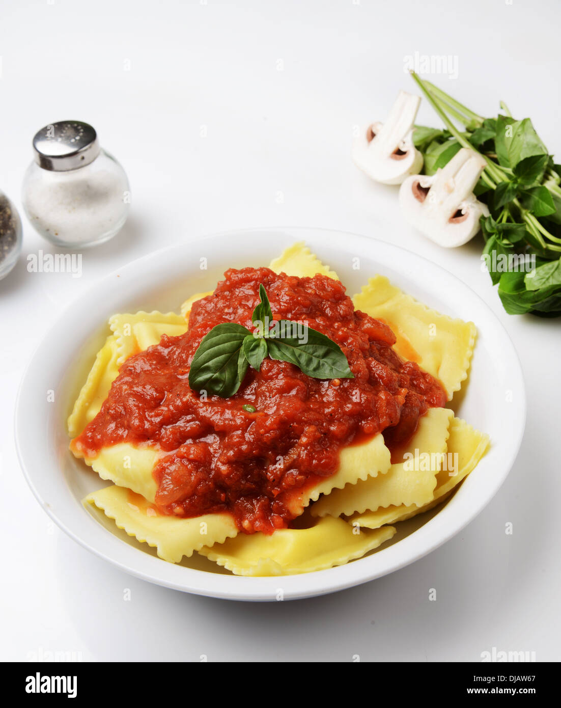plate of Ravioli with marinara sauce Stock Photo