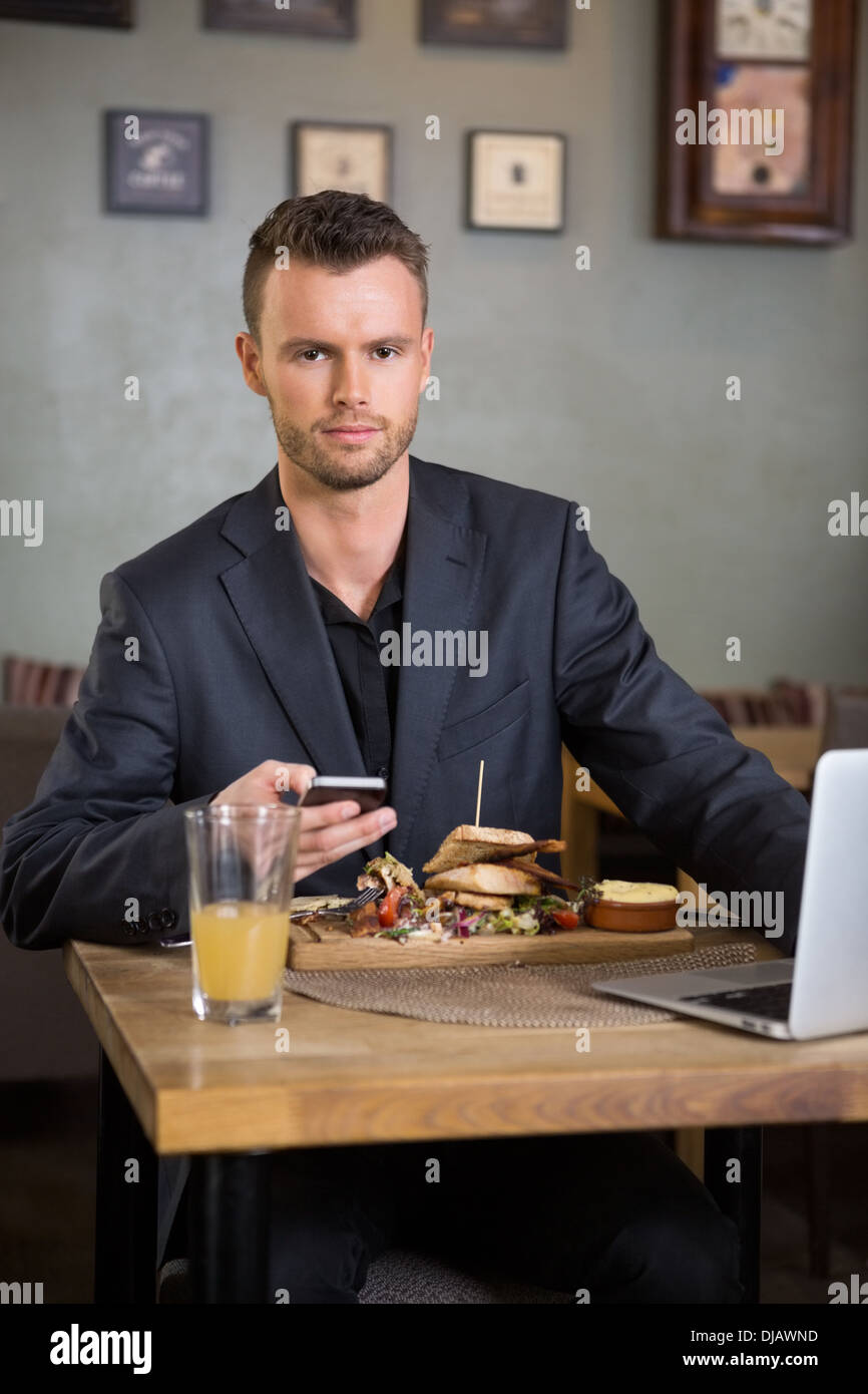 Man laptop computer sandwich hi-res stock photography and images - Alamy