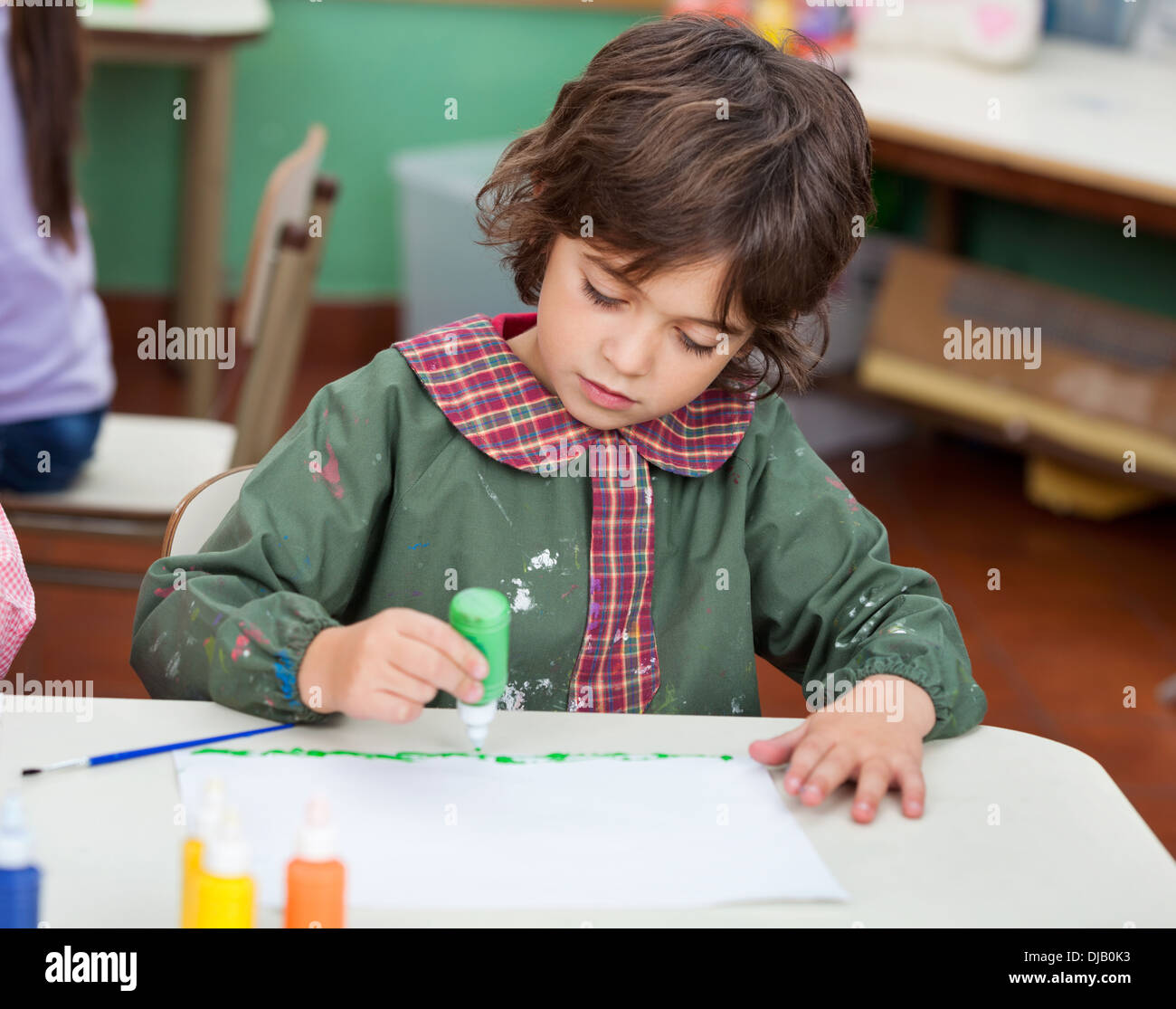 Little Boy Drawing In Art Class Stock Photo - Alamy