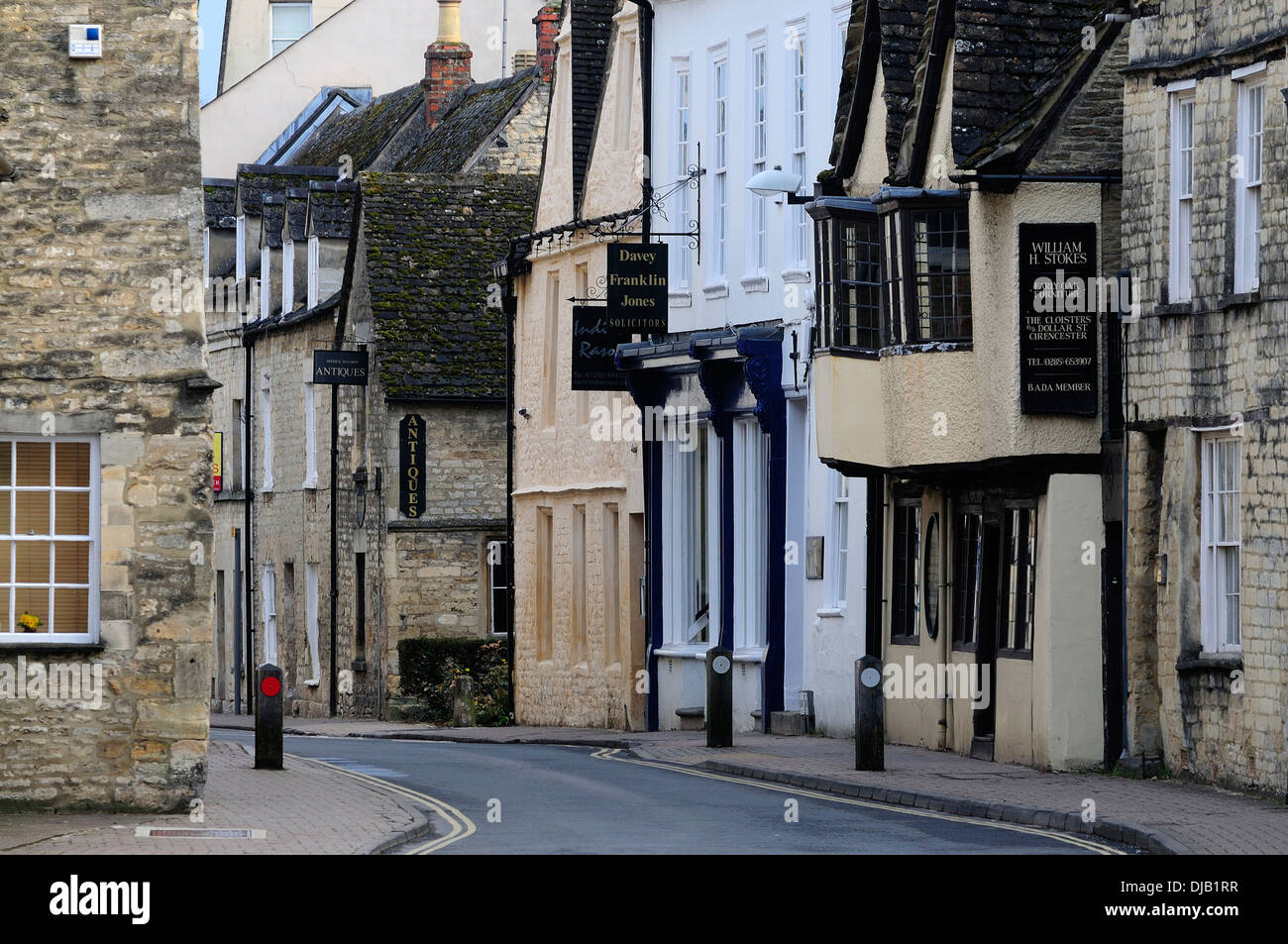 A view of a pretty street in Cirencester in the Cotswolds UK Stock Photo