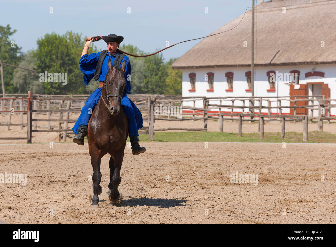 Csikós on horseback, Tanyacsárda Stud, Kecskemét, Puszta, Hungary Stock Photo