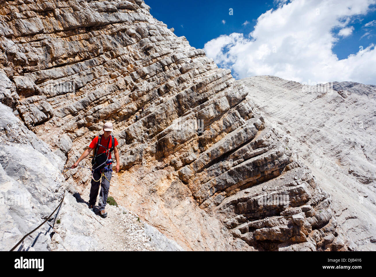 Climber on the descent from Mt Monte Cristallo, Via Ferrata Ivano Dibona,  Dolomites, Belluno, Italy Stock Photo - Alamy